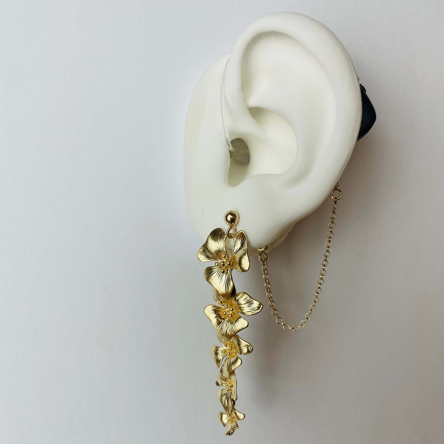 Tasha Ghouri Deafmetal earrings